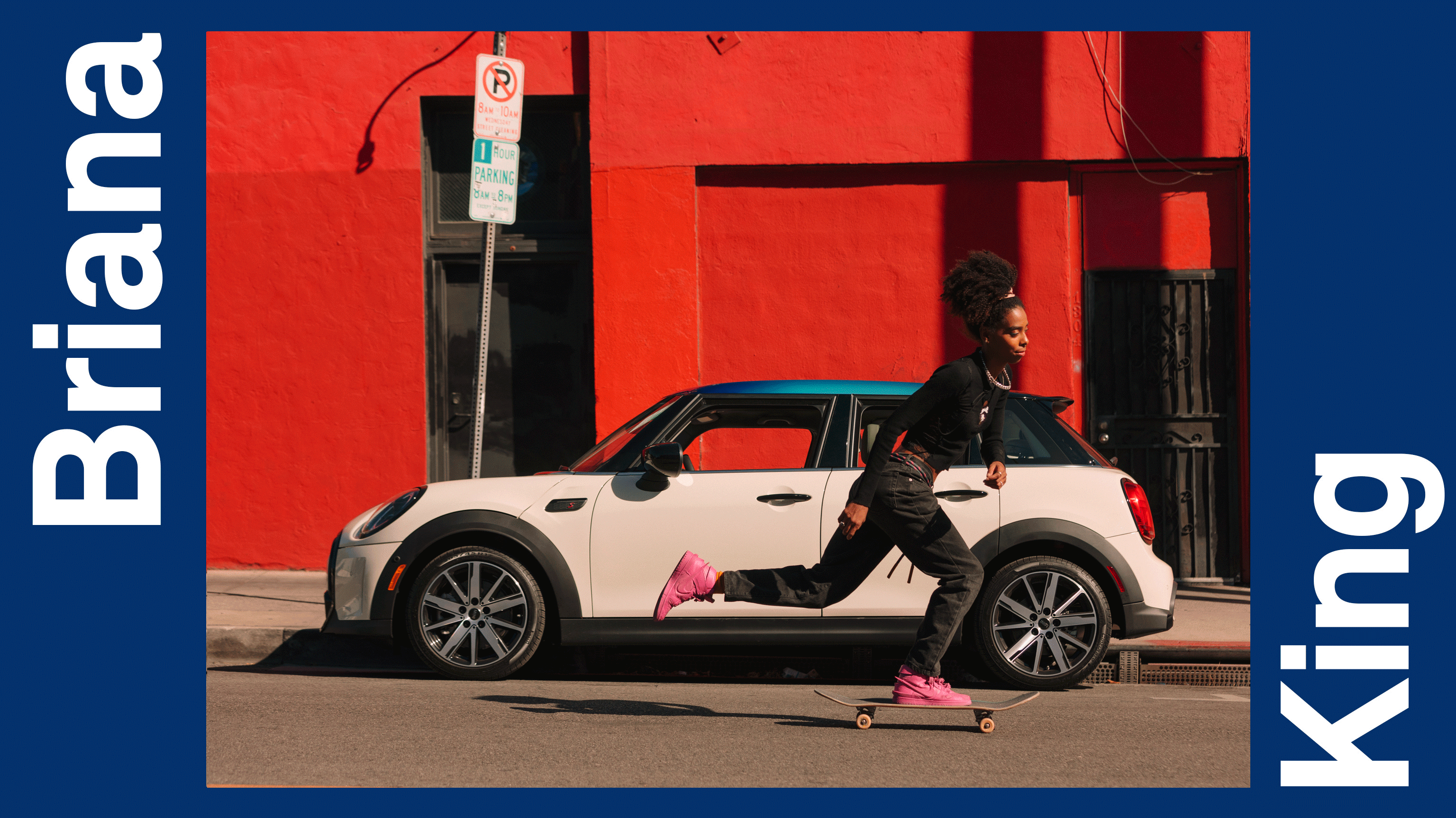 Briana King skateboarding in front of a white MINI cooper.